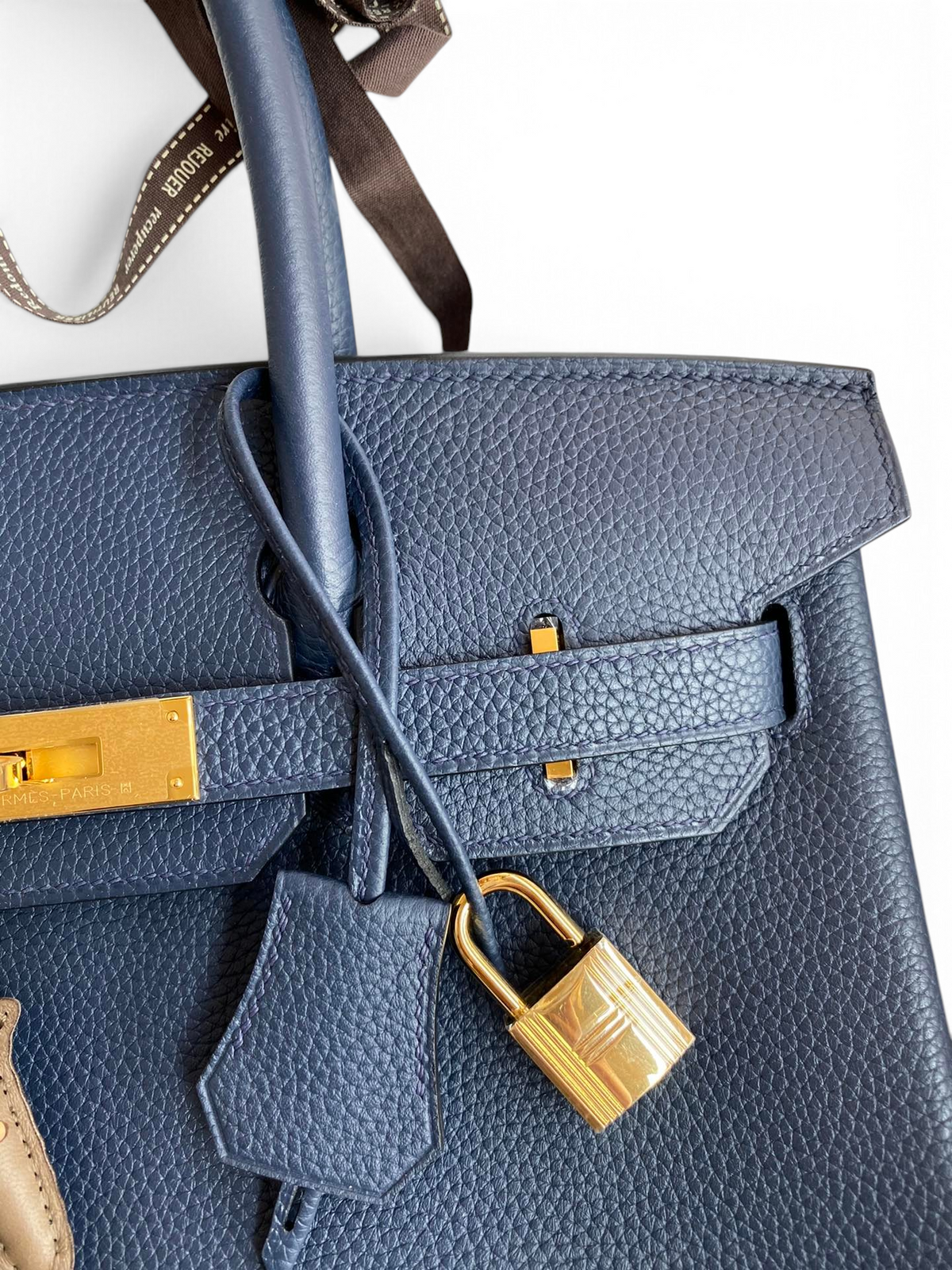 SWORD LUXURY lacivert Togo deri Birkin 30 çanta, altın tonlu donanım, kilit ve clochette detaylı.