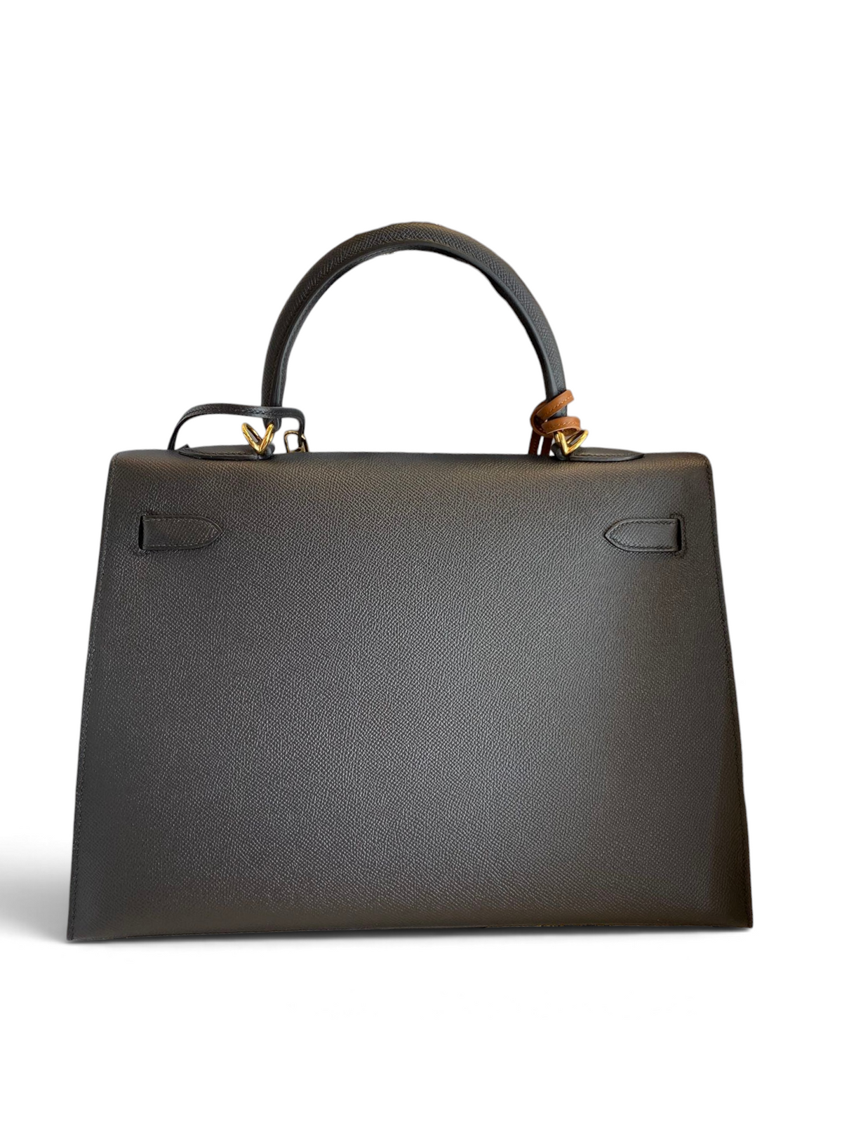SWORD LUXURY marka, 32 cm boyutunda, siyah Epsom deri Hermès Kelly çanta, kutusu ve toz torbası ile birlikte.