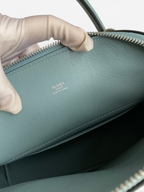SWORD LUXURY Hermès Bolide 27cm çanta iç detayı, açık mavi Togo deri dokusu ve gümüş renkli fermuar.