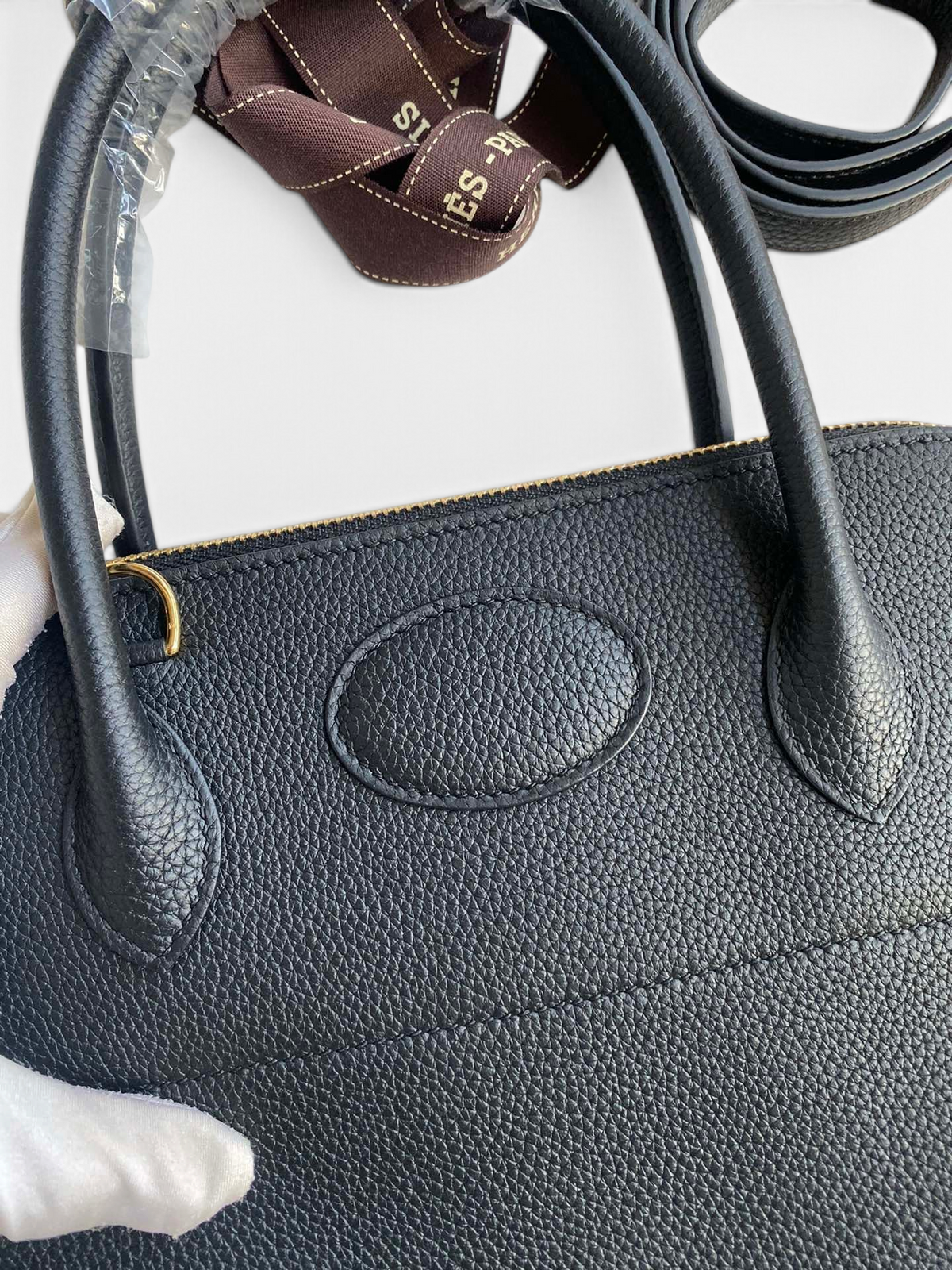 SWORD LUXURY marka siyah Togo deri Hermès Bolide 31cm çanta, yuvarlak hatlı ve fermuarlı detaylı lüks tasarım.