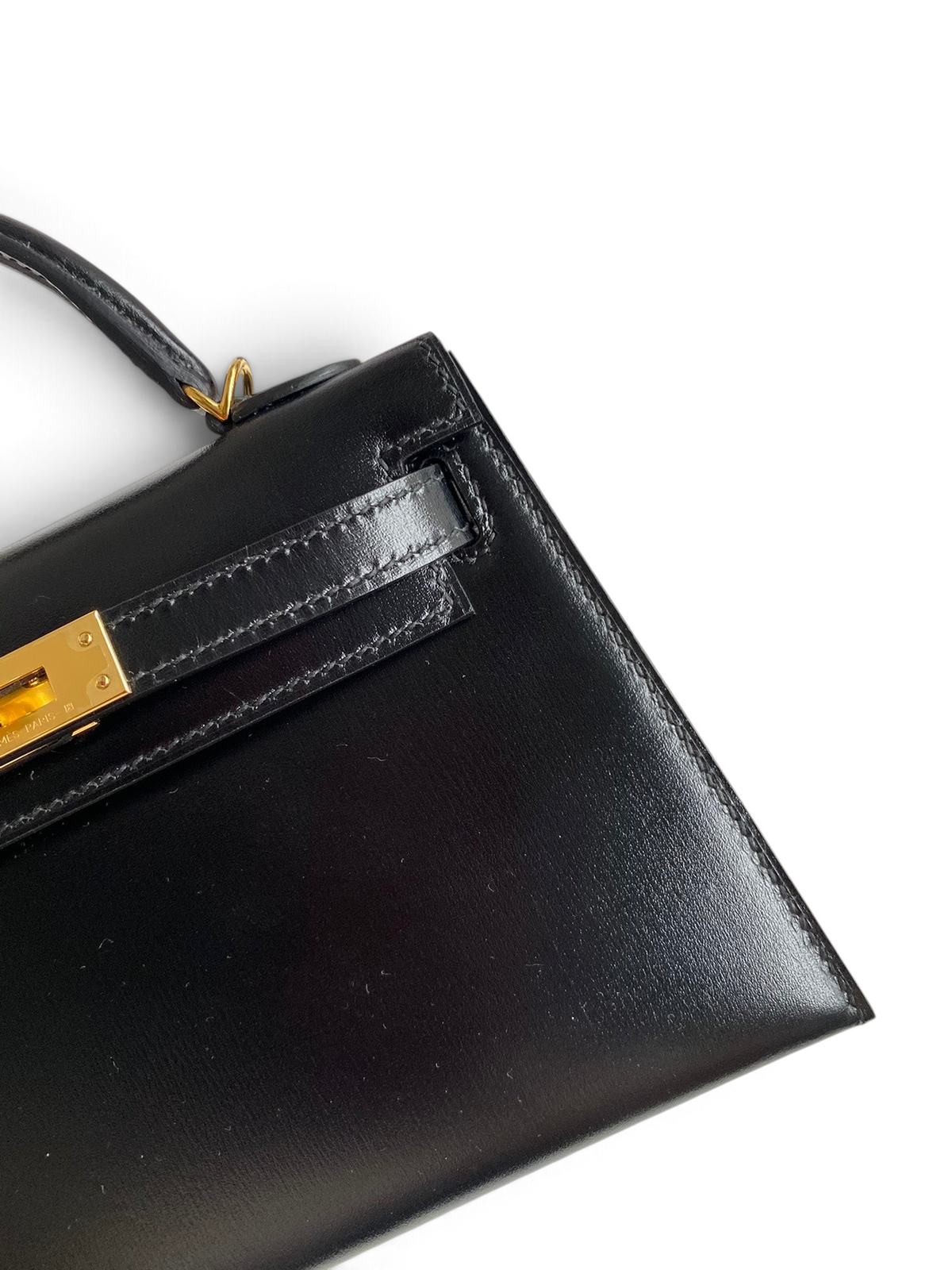 SWORD LUXURY siyah box deri Hermès Mini Kelly 19cm çanta, altın rengi metal kilit detaylı ve şık kutusunda.