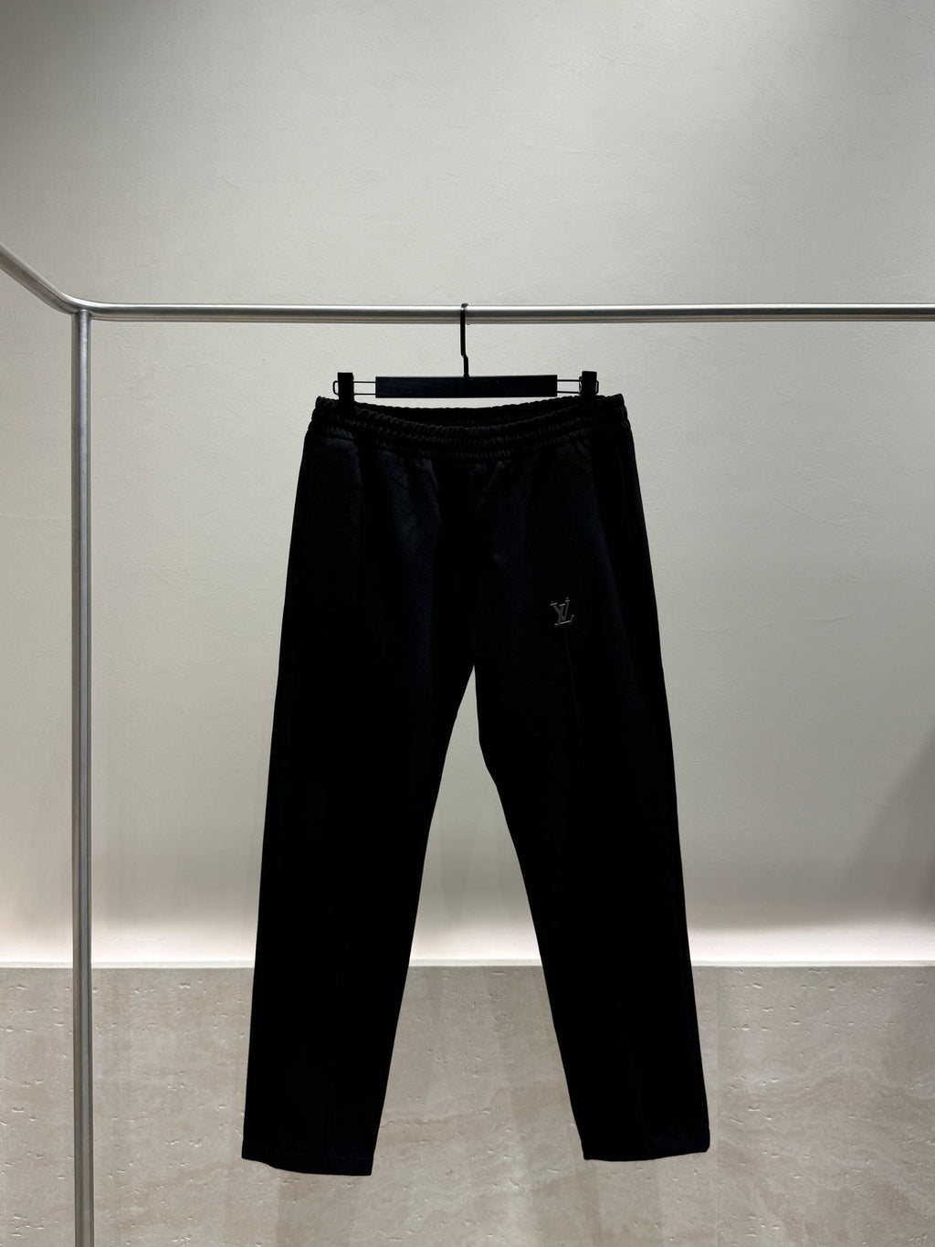 Black tracksuit trousers front view