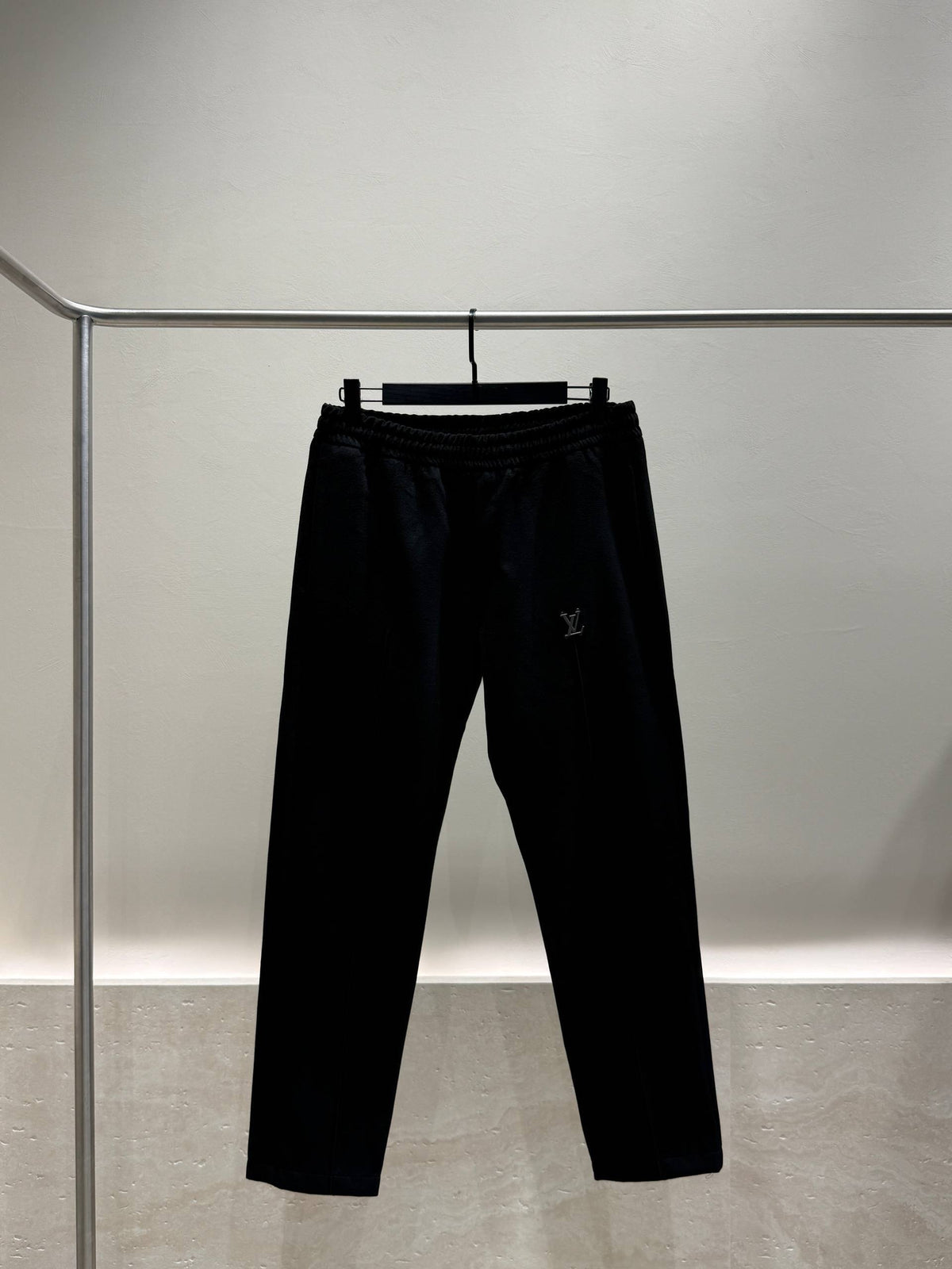 Black tracksuit trousers front view