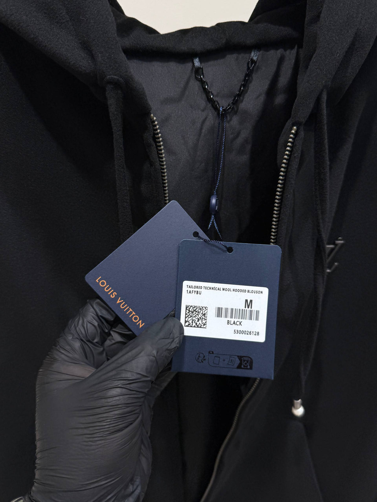 Jacket hangtag and inner detail