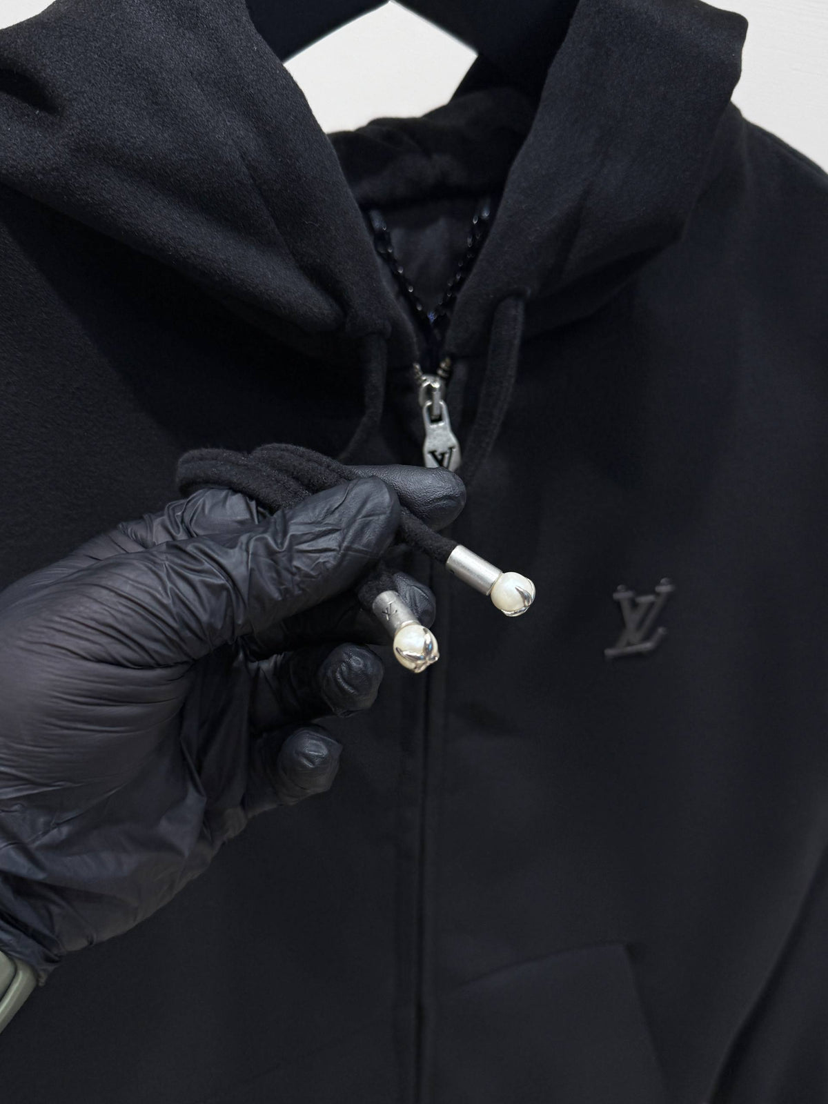 Hoodie drawstring and zipper detail