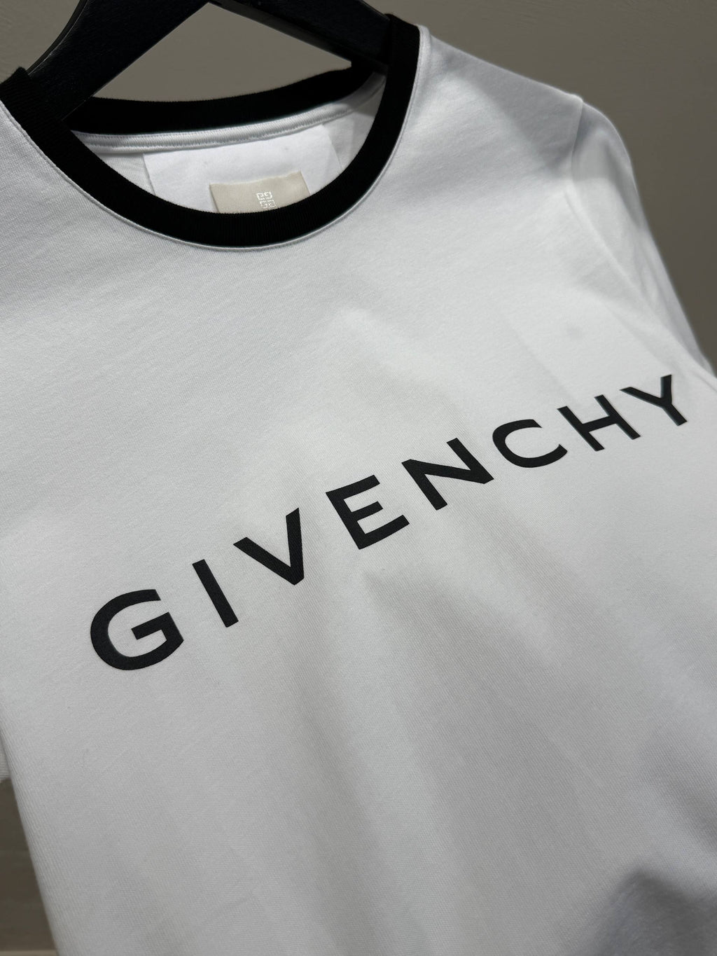 Women's ringer T-shirt logo detail