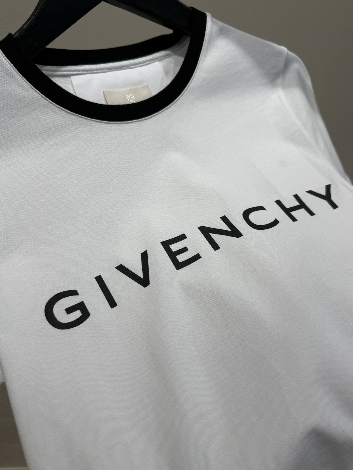 Women's ringer T-shirt logo detail